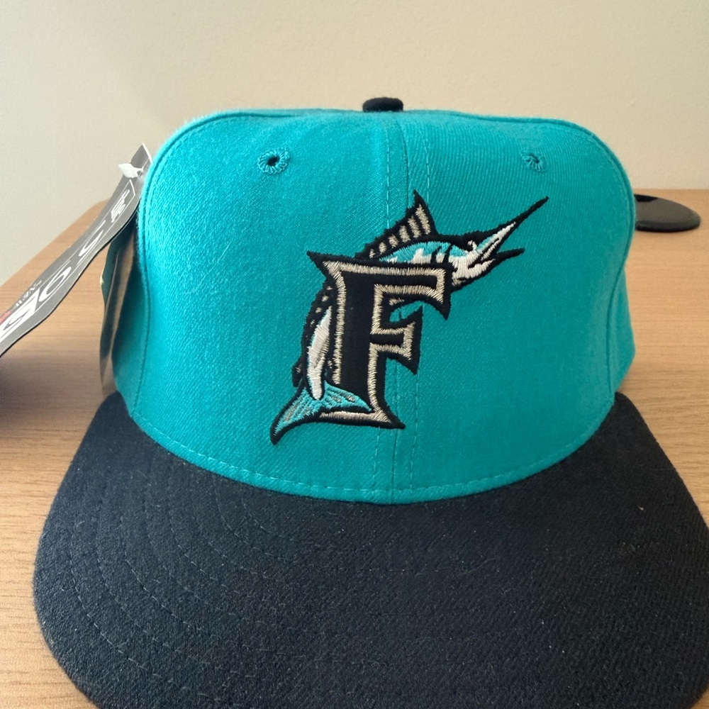 New Era Teal and Black Baseball Cap